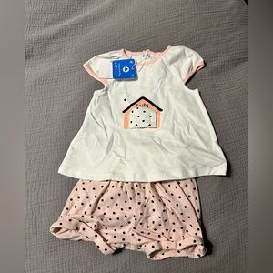 Top and short set. Cute peek a boo dog on top.